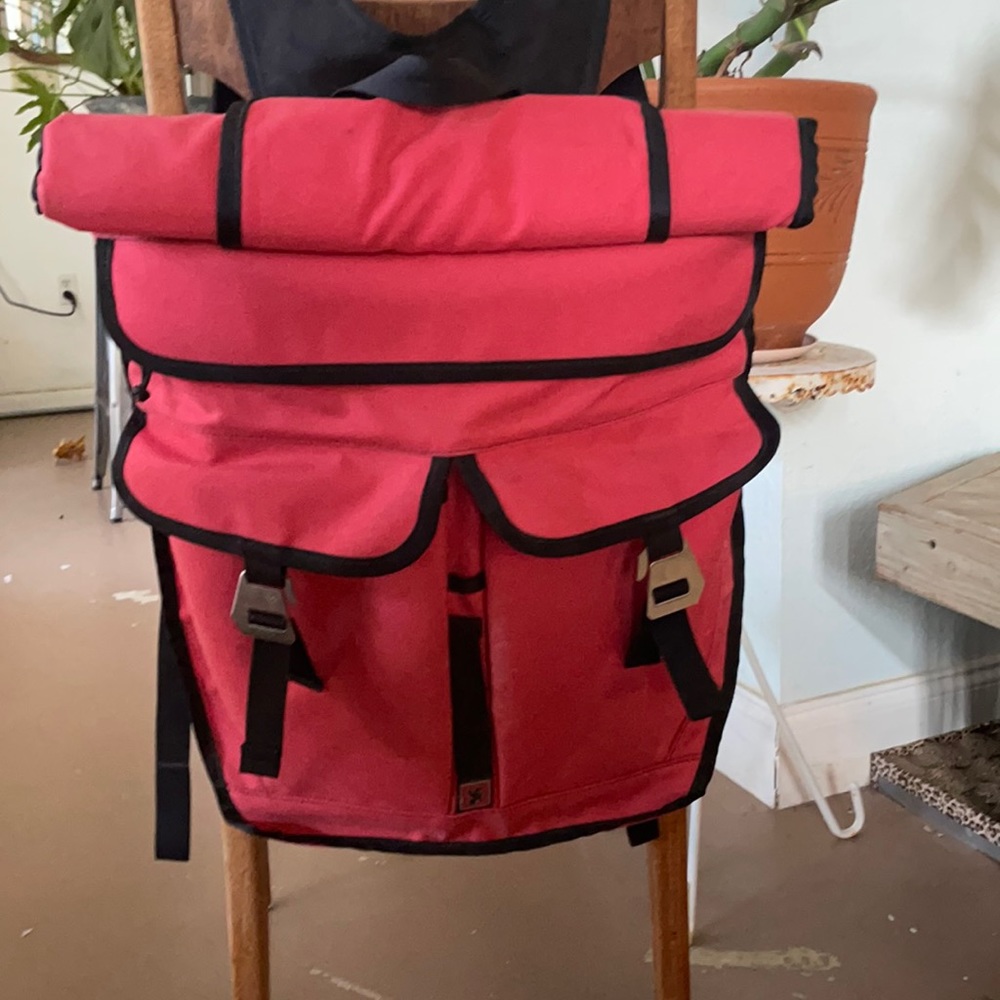 Chrome roll top backpack in coral